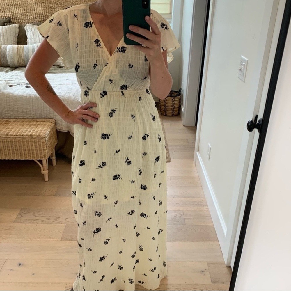 Chic Cream Floral Maxi Dress with velvety black flowers.